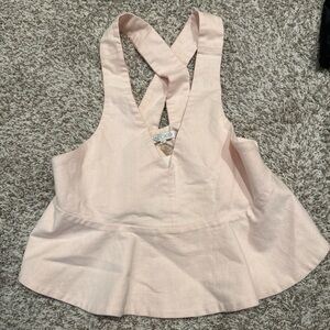 Alexis Light Pink Cross-Back Peplum Blouse